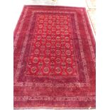 AN AFGHAN CARPET 290 x 205 cms.