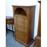 AN INTERESTING LATE VICTORIAN SIDE LOCKING COLLECTORS CHEST OF FOURTEEN GRADUATED DRAWERS WITH