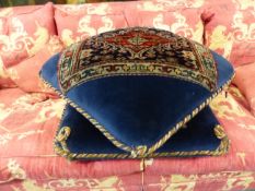AN INTERESTING ANTIQUE FOOTSTOOL FORMED AS TWO STACKED CUSHIONS.