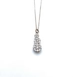 A TRIPLE GRADUATED DIAMOND CLUSTER DROP PENDANT, APPROX ESTIMATED DIAMOND WEIGHT 0.50cts,