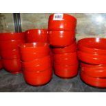 A COLLECTION OF JAPANESE RED LACQUER BOWLS AND COVERS IN VARIOUS SIZES, THE LARGEST EIGHT WITH