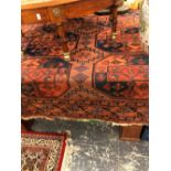 AN ANTIQUE AFGHAN BOKHARA CARPET. 271 x 219cms