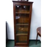 A SMALL EDWARDIAN GLAZED OAK BOOKCASE