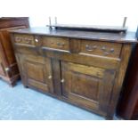 AN 18th C. AND LATER OAK CHEST WITH THREE DRAWERS OVER DOORS AND THE STILE FEET.   W 130 x D 49 x