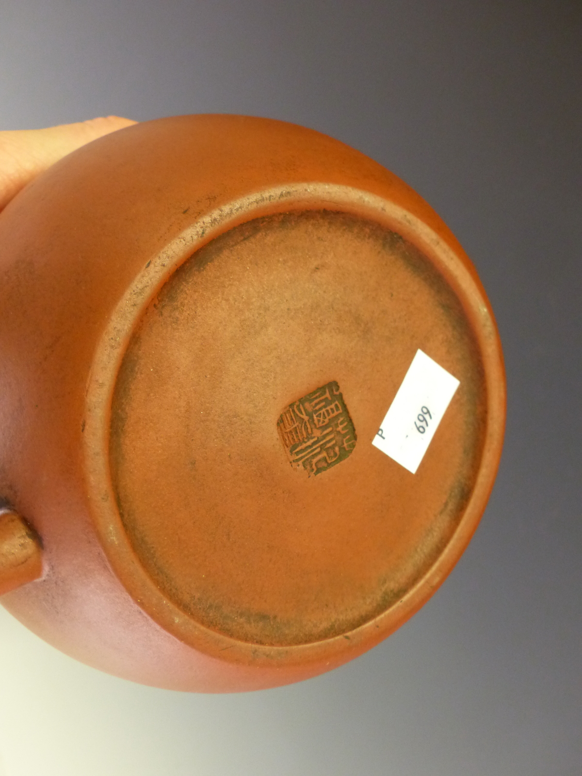 A CHINESE YIXING RED WARE TEA POT BEARING SEAL MARKS INSIDE THE COVER AND ON THE FOOT. Dia 15cms. - Image 6 of 15