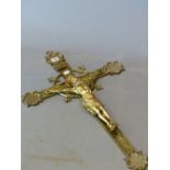 A LATE 19th C. GILT BRONZE CRUCIFIX, CHRISTS HALO PICKED OUT IN RED, THE END OF THE CROSS WITH