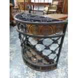 AN ANTIQUE WROUGHT IRON STICK STAND.