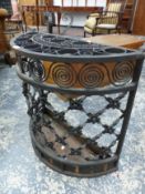 AN ANTIQUE WROUGHT IRON STICK STAND.