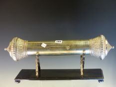 A 1911 PRESENTATION INDIAN WHITE METAL CYLINDER WITH GADROONED AND FOLIATE ENDS AND REMOVABLE FROM