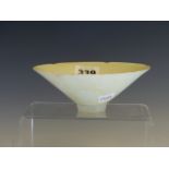 A QINGBAI BOWL INCISED WITH FLOWERS AND FOLIAGE INSIDE A RIM WITH SIX INDENTATIONS. Dia. 14cms. WITH