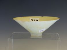 A QINGBAI BOWL INCISED WITH FLOWERS AND FOLIAGE INSIDE A RIM WITH SIX INDENTATIONS. Dia. 14cms. WITH