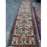 A PAIR OF UNUSUAL ANTIQUE PERSIAN TRIBAL RUNNERS WITH ANIMAL MOTIFS 375 x 104 cms (2)
