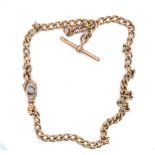 AN VINTAGE HALLMARKED GOLD SINGLE ALBERT POCKET WATCH CHAIN, COMPLETE WITH T-BAR. LENGTH 37cms,