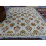 AN INDIAN KASHMIR NEEDLEWORK CARPET. 364 x 277cms