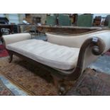 A REGENCY SIMULATED ROSEWOOD SHOW FRAME CHAISE LONGUE UPHOLSTERED IN BEIGE