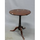 A 19th C. MAHOGANY TILT TOP TRIPOD TABLE, THE DISHED CIRCULAR TOP ON A GUN BARREL COLUMN, THE LEGS