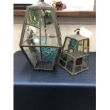 TWO LEADED GLASS LANTERNS. H 43 AND 25cms (2)