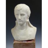 AN ANTIQUE CARVED MARBLE BUST OF NAPOLEON, SIGNED INDISTINCTLY TO BACK OF SHOULDER.