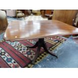 A 19th C. MAHOGANY BREAKFAST TABLE, THE RECTANGULAR TOP ON A BALUSTER COLUMN, THE FOUR REEDED LEGS