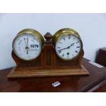 AN EARLY 20th CENTURY DESK CLOCK AND BAROMETER PAIR WITH CARVED OAK SUPPORT. EACH DIAL OF THE JOINED