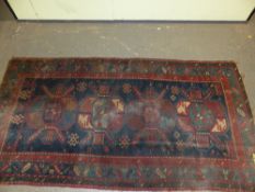 AN ANTIQUE CAUCASIAN KAZAK RUG 240 x 127 cm