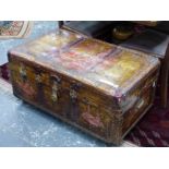 A VINTAGE HAND PAINTED LARGE CABIN TRUNK RAISED ON TURNED LEGS. H 49 X W 99 X D 60cms.