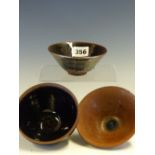 THREE JIAN TYPE BOWLS GLAZED IN BLACK, OIL SPOT AND MATT BROWN, THE LARGEST. Dia. 12cms.