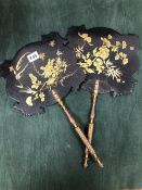 A PAIR OF 19th C. BLACK LACQUER FACE SCREENS GILT WITH CHINOISERIE FLOWERS AND INSECTS. THE GILT