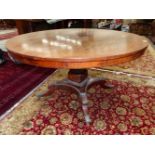 A REGENCY MARQUETRIED ROSEWOOD BULLOCK TASTE BREAKFAST TABLE, THE CIRCULAR TOP WITH A BAND OF