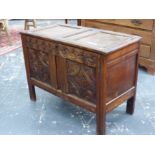 A 17th CENTURY AND LATER OAK SMALL PANEL COFFER. H 71 X W 97 X D 47cms.