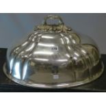 AN ELECTROPLATE MEAT PLATTER COVER WITH A FOLIATE HANDLE BY SAVORY AND SONS, LONDON. W 45.5cms.