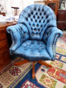 AN ANTIQUE STYLE BUTTON UPHOLSTERED LEATHER DESK CHAIR