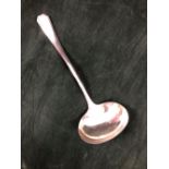 A SILVER OLYMPIA PATTERN SOUP LADLE BY MOSLEY & Co., SHEFFIELD 1942, 260Gms.