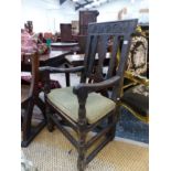 AN 18th CENTURY AND LATER OAK ARM CHAIR.