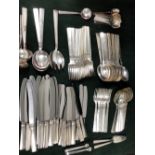 A 20th C. SCANDINAVIAN 830 SILVER CUTLERY SET, COMPRISING: 11 TABLE KNIVES, 12 TEA KNIVES, 18