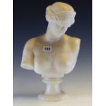 AN EARLY 20th C. WHITE ALABASTER BUST OF A CLASSICAL LADY, HER HAIR BRAIDED AROUND A CRESCENT SHAPED