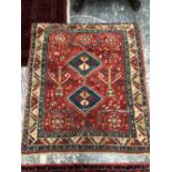 AN ANTIQUE CAUCASIAN KAZAK PRAYER RUG 126 X 113 cm