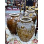 THREE ANTIQUE LARGE CHINESE BROWN GLAZED JARS.