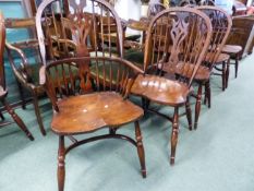 A SET OF EIGHT BESPOKE WINDSOR TYPE CHAIRS INCLUDING TO ARMCHAIRS. ALL WITH CRINOLINE STRETCHER