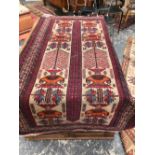 A BELOUCH RUG. 182 x 104cms