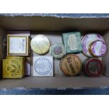 A COLLECTION OF PACKAGES AND TINS OF OINTMENTS