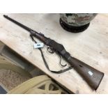 RIFLE- OBSOLETE CALIBRE SECTION 58- A MARTINI HENRI 577/450 RIFLE WITH EASTERN SILVER WRAP