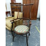 AN EDWARDIAN ART NOUVEAU HIGH BACK SPINDLE ARM CHAIR.