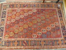 AN ANTIQUE PERSIAN AFSHAR RUG. 182 x 128cms TOGETHER WITH ANOTHER SMALLER ANTIQUE PERSIAN RUG (2)