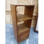 A HEALS OAK CABINET OF TWO SHELVES OVER A CUPBOARD. W 33 x D 27.5 x H 86cms.