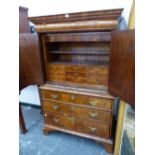 A GEORGIAN AND LATER WALNUT CABINET ON CHEST, AN OVOLU FRONTED DRAWER ABOVE THE DOORS TO THE TOP, TH