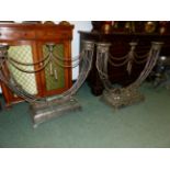 A PAIR OF NEO CLASSICAL WROUGHT IRON STANDS, TOGETHER WITH A PAIR OF METAL VASES, A BUCKET AND A