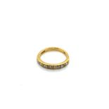 AN 18ct HALLMARKED GOLD SEVEN STONE DIAMOND HALF ETERNITY RING. FINGER SIZE Q. WEIGHT 3.65grms.