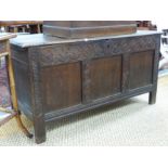 AN EARLY 18th CENTURY OAK PANEL FRONT COFFER. H 70 X W 132 X D 57cms.