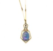 AN EARLY 20th CENTURY OPAL AND GARNET OPEN WORK ART DECO STYLE PENDANT, SUSPENDED ON A FANCY LINK